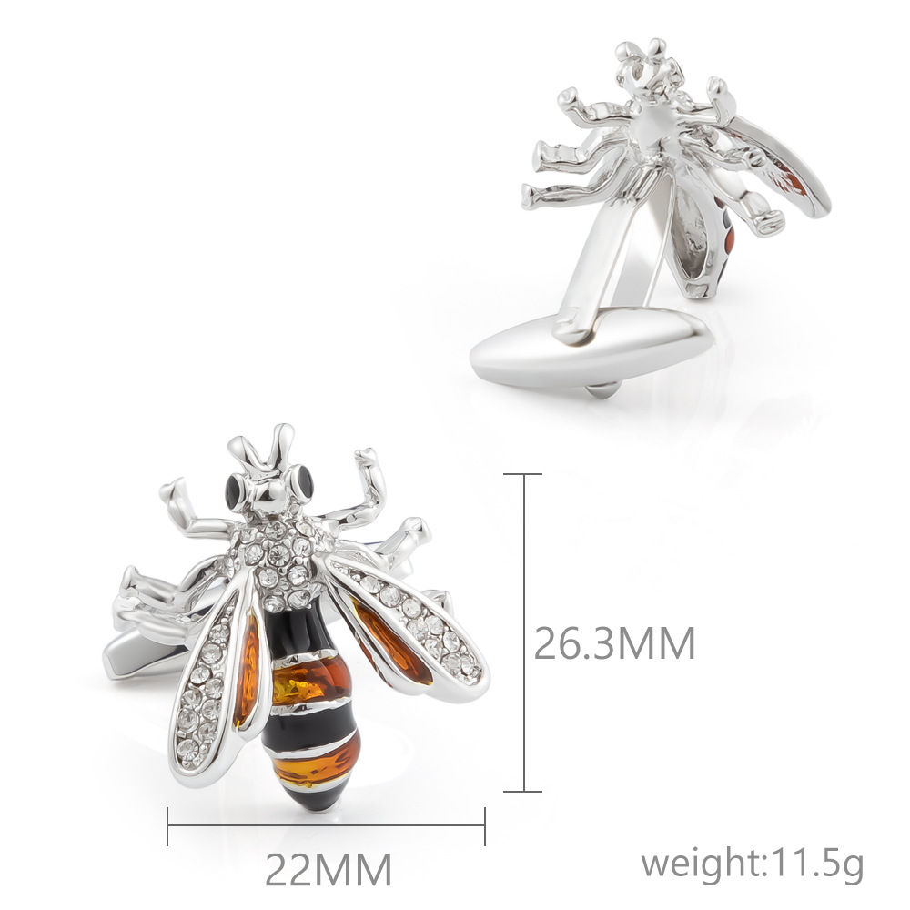 Bee shape metal cufflinks set with diamonds