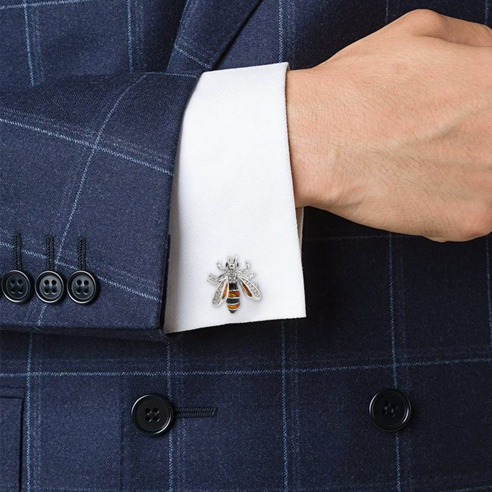 Bee shape metal cufflinks set with diamonds