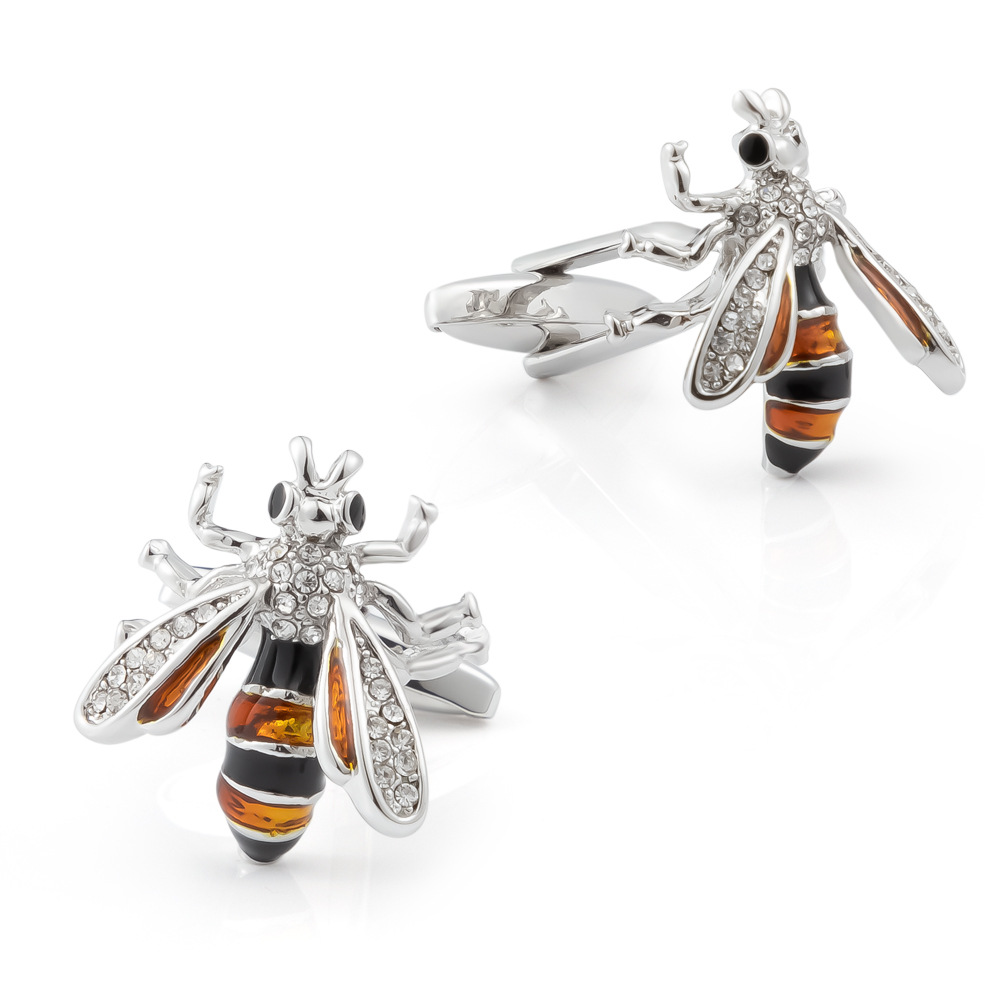 Bee shape metal cufflinks set with diamonds